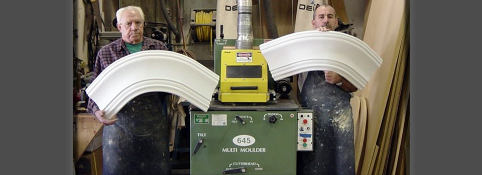Mikron shop team with curved mouldings produced on the M645 Multi-Moulder